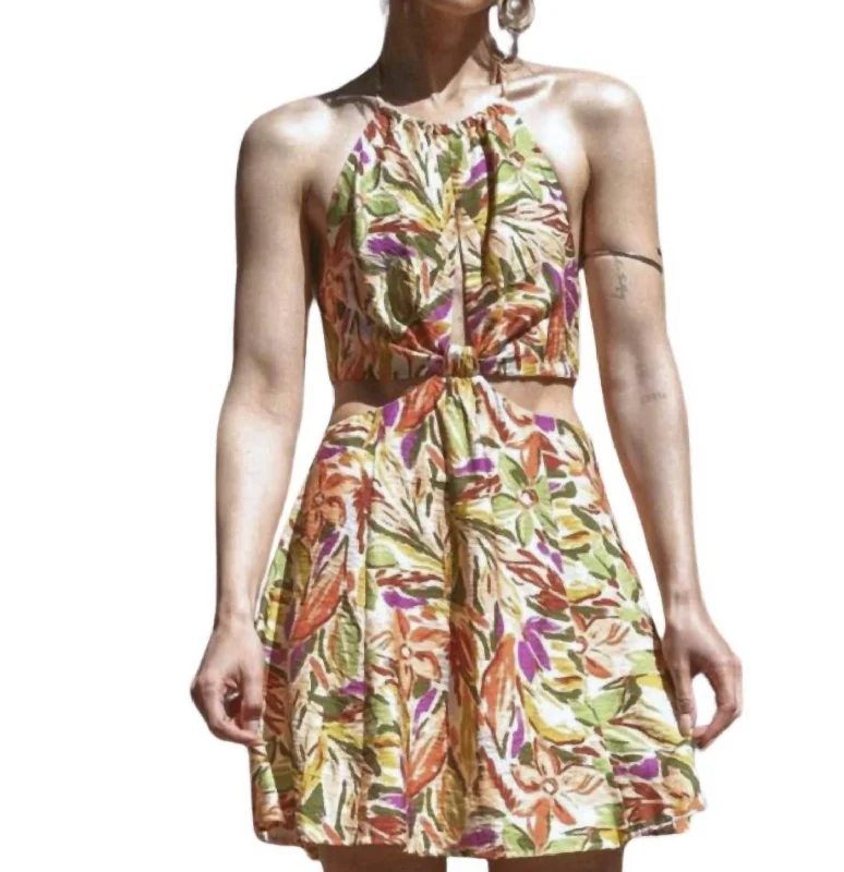 Step into style with our women’s clothing collection   Tropical Halter Dress In Green Multi